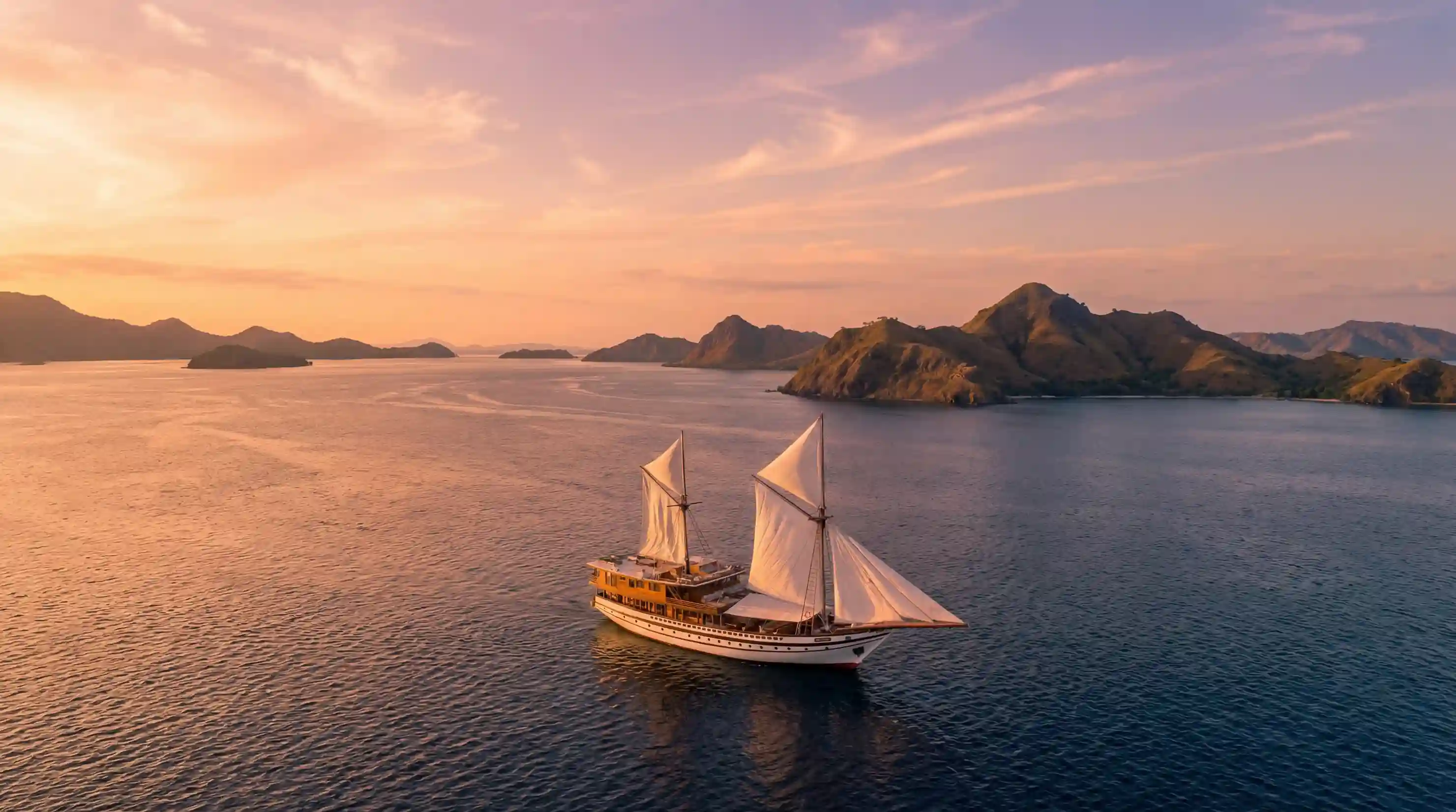 A private charter under sail among the islands of Komodo