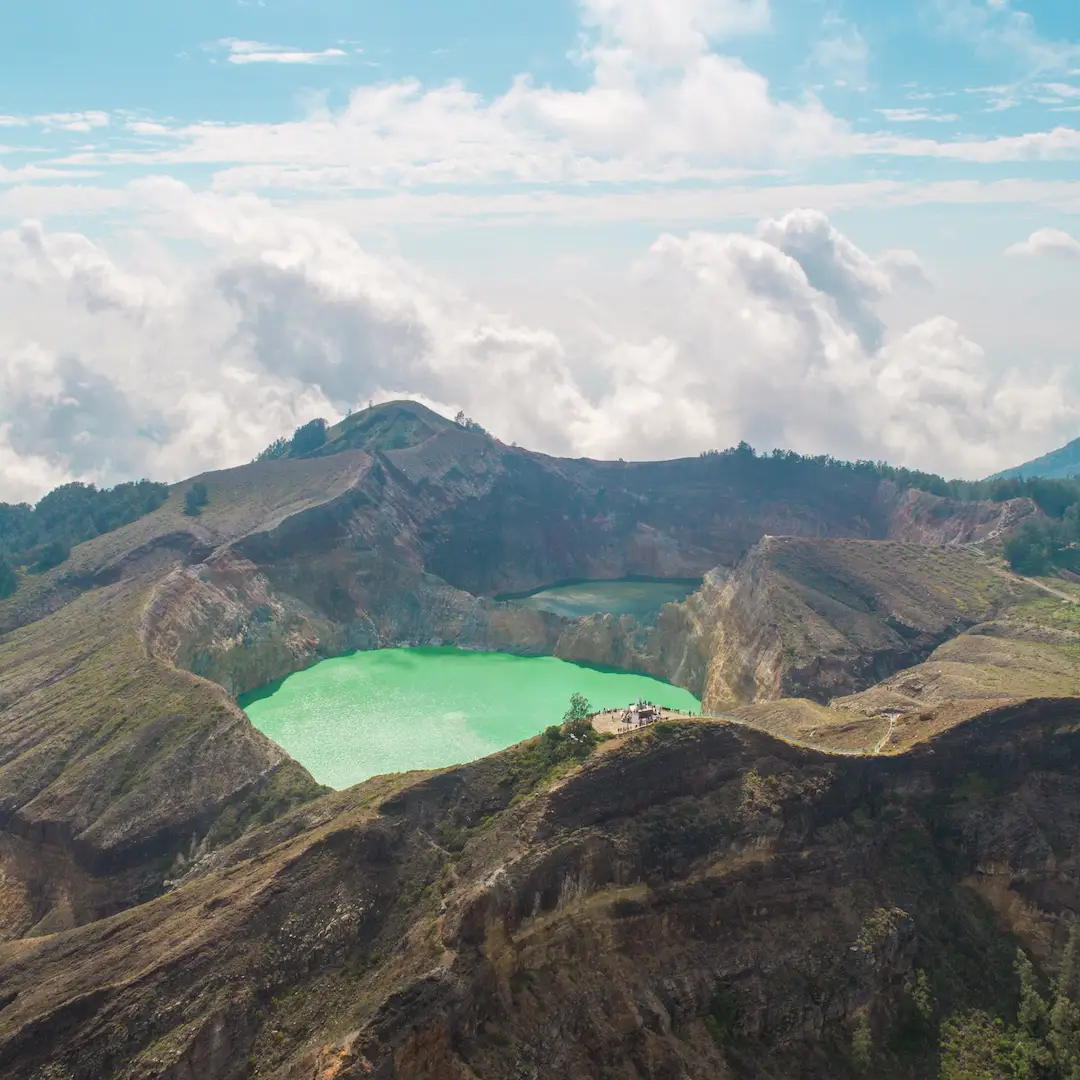 A crater lake on the summit of Kelimutu, seen from the rim
